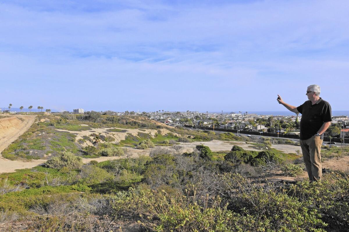 George Basye, president of Newport Banning Ranch, looks over the expanse. A California Coastal Commission staff ecologist called the 401-acre tract one of the few “reasonably intact wetland-bluff ecosystems” left on the California coast.