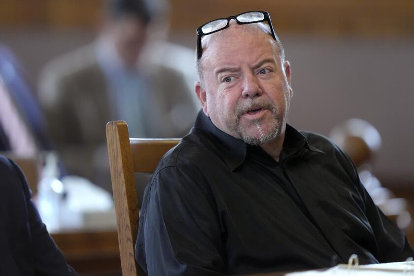 FILE - Steve Kramer is seated Wednesday, June 5, 2024, at Superior Court, in Laconia, N.H., during his arraignment in connection with charges of voter suppression and impersonating a candidate. (AP Photo/Steven Senne, Pool)