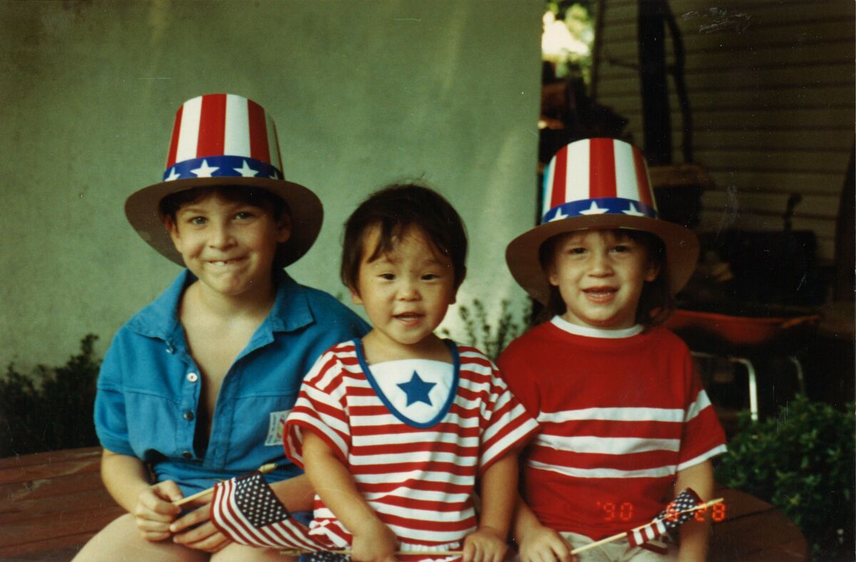Young Sam Futerman and brothers Matthew and Andrew celebrate her U.S. citizenship.