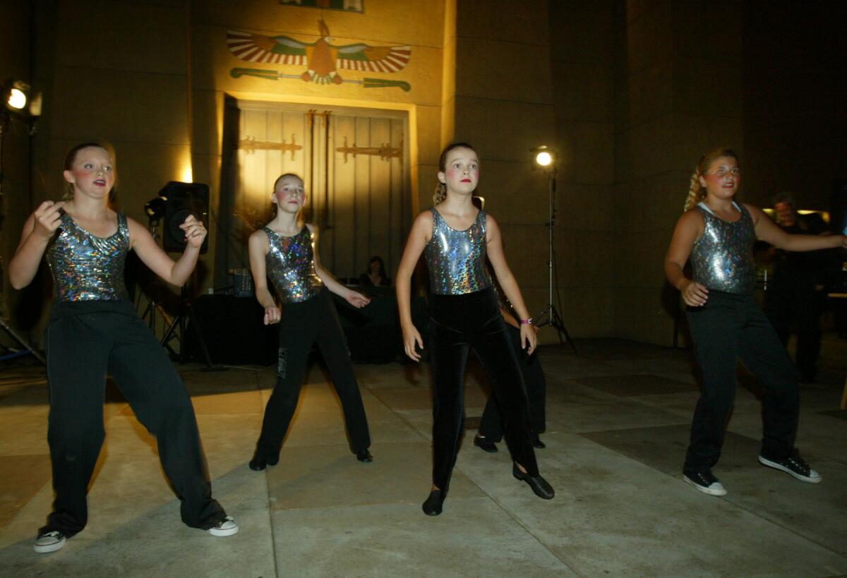Girls in the dance group "Anti Gravity" put on a performance at the premiere party for the director's cut of "Donnie Darko" at the Egyptian Theater in Hollywood on July 15, 2004. (Lori Shepler / Los Angeles Times)