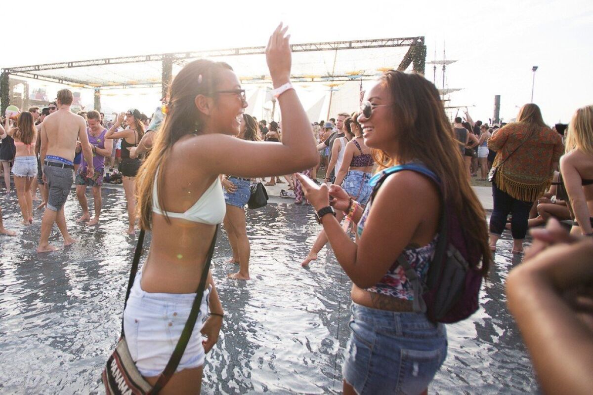 CRSSD Festival attendees frolic at the 2015 debut edition of the electronic music marathon at San Diego's Waterfront Park.