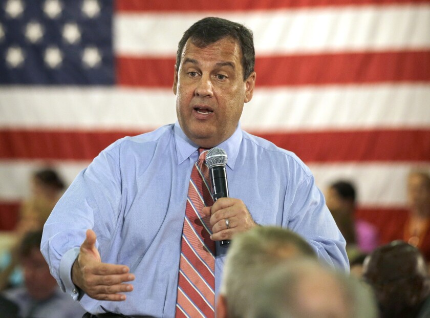New Jersey Gov. Chris Christie, pictured in Haddon Heights last week, has kept relatively quiet on the Hobby Lobby contraception case.