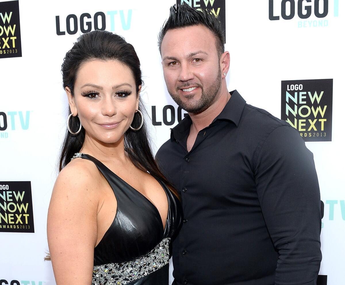 Jenni "JWoww" Farley and Roger Mathews attend the NewNowNext Awards in Los Angeles,