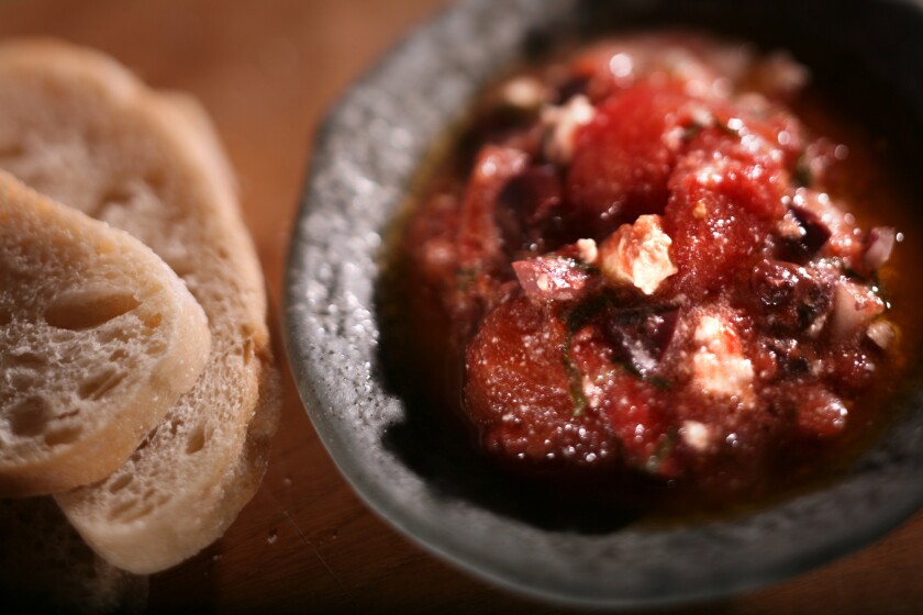 Culinary SOS is one of our most popular features: You ask us for a recipe, and we do our best to get it. Email recipe request to Test Kitchen manager Noelle Carter at noelle.carter@latimes.com. Include your name, city and daytime phone number. Tomato-feta relish from Palomino. Recipe