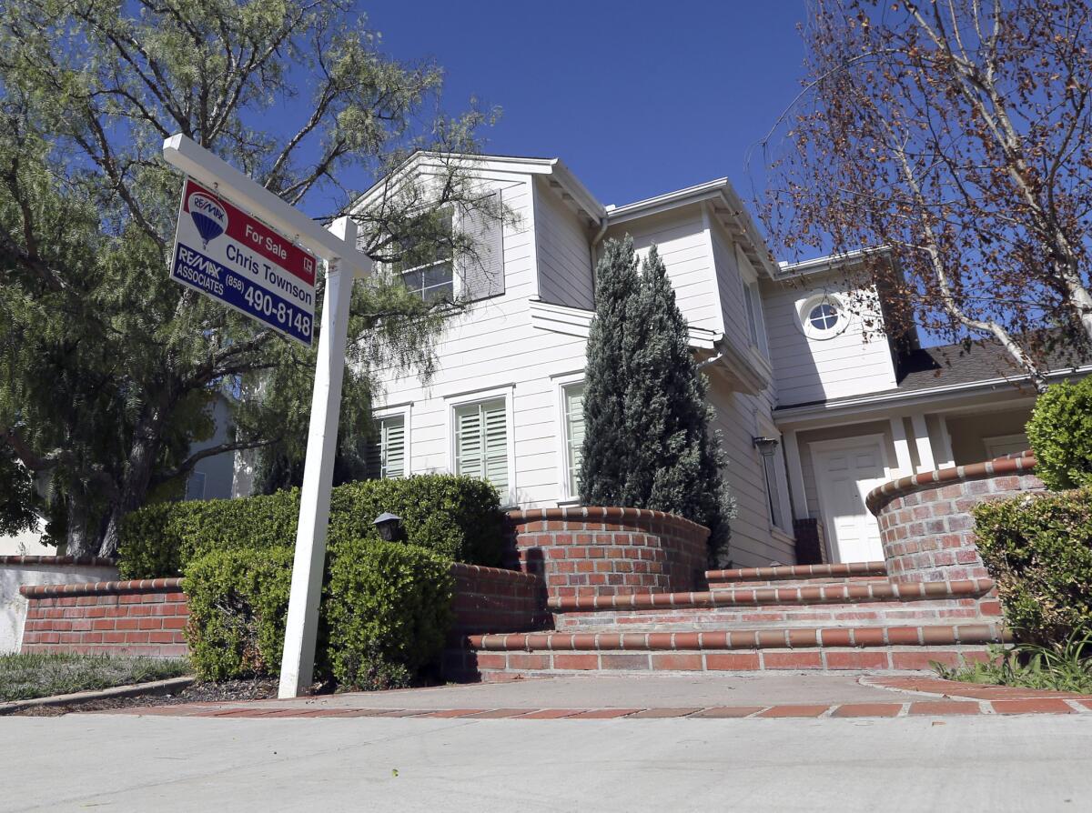 A realty sign last year in front of a home for sale in Carlsbad.