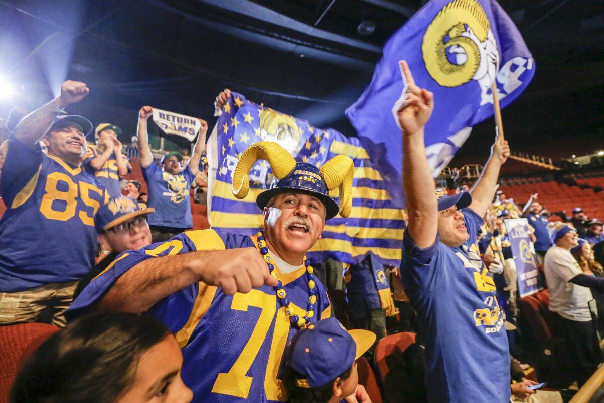 Rams fans celebrate at a January news conference at the Forum welcoming the team back to Los Angeles.