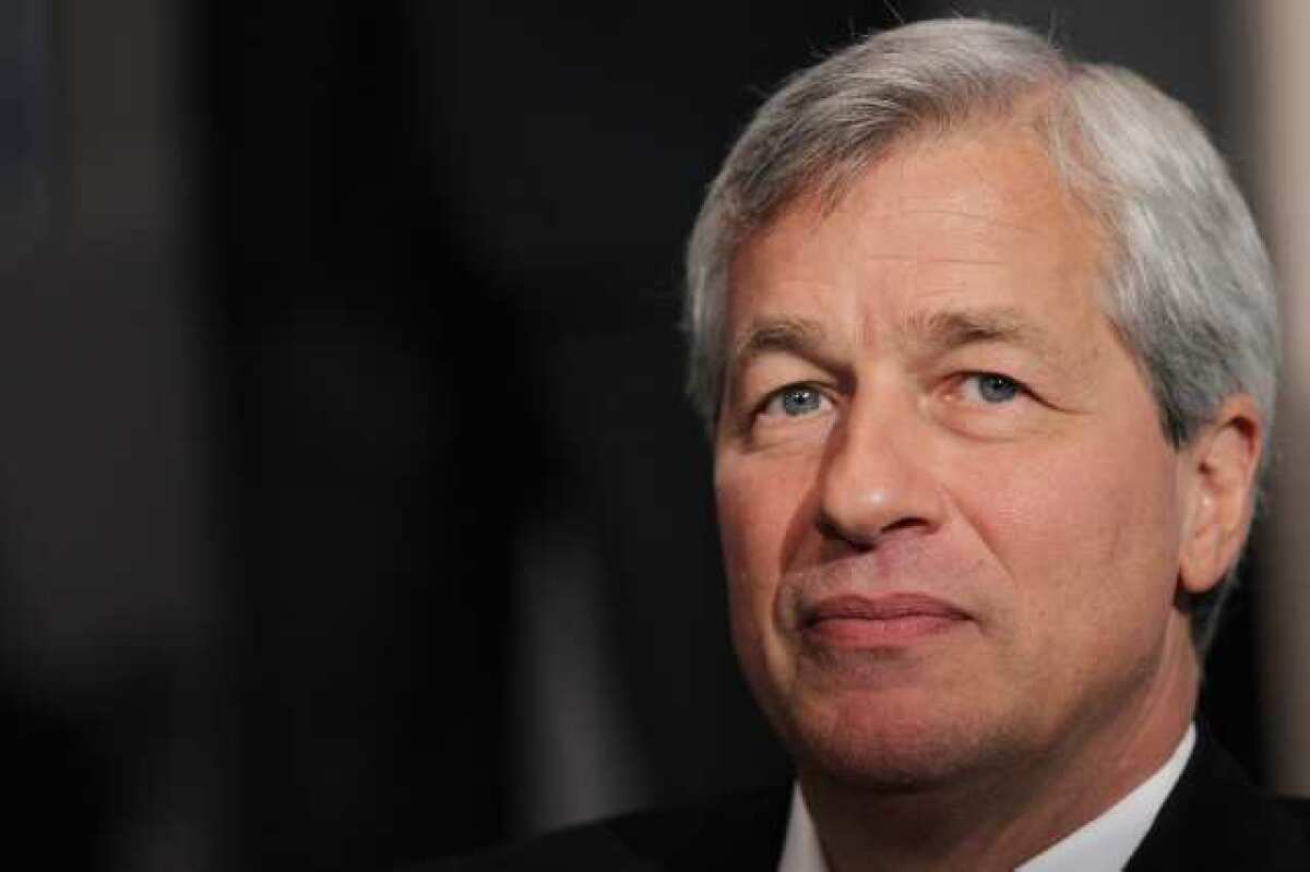 JPMorgan Chase & Co. shareholders at the company's annual meeting are debating whether chairman and CEO Jamie Dimon should continue to hold both positions.