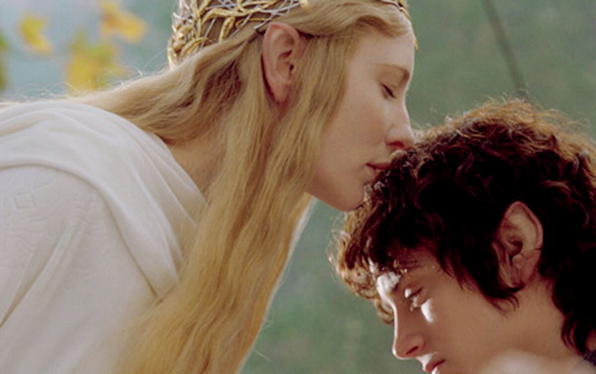 Actress Cate Blanchett and Elijah Wood in 'The Lord of the Rings The Fellowship of the Ring'