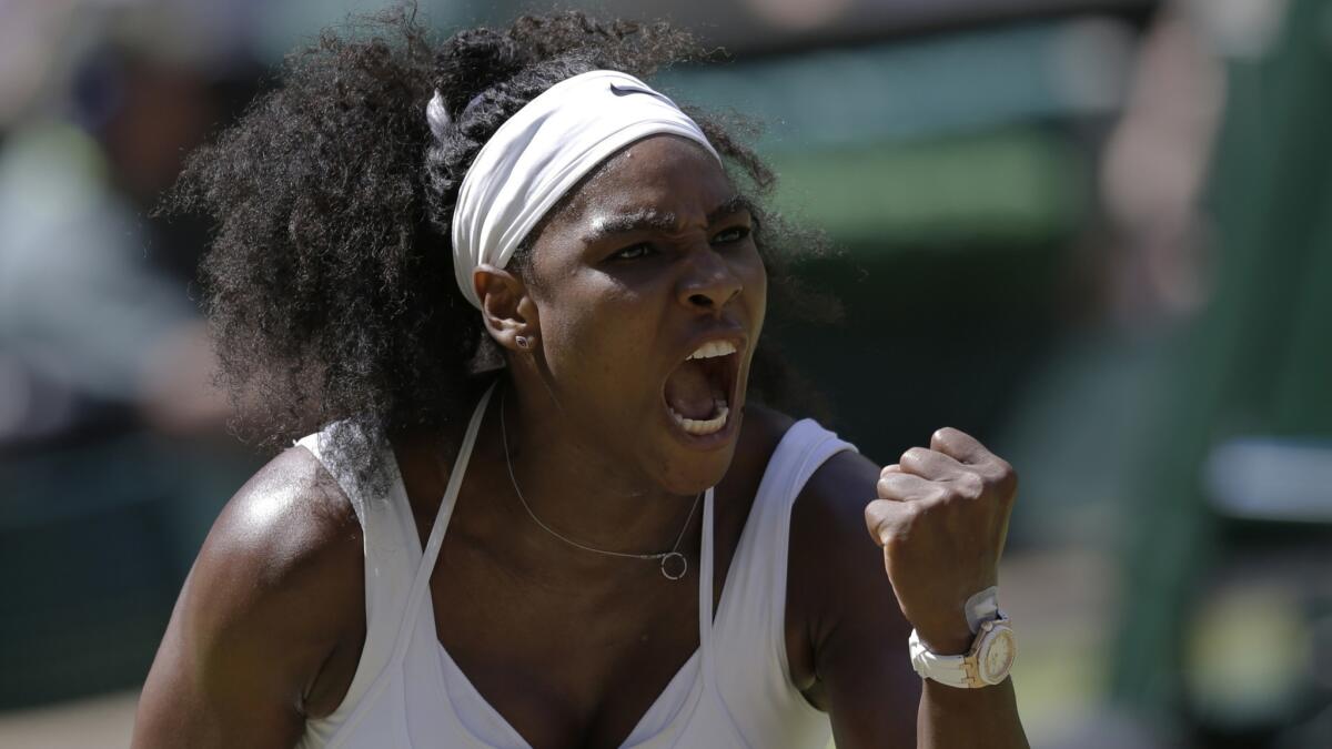 Serena Williams celebrates a point during her victory over Garbiñe Muguruza in the Wimbledon final on Saturday.