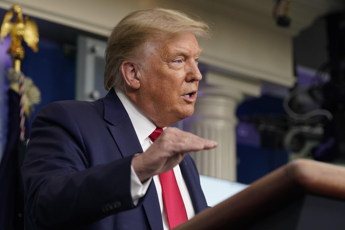 President Trump speaks during a news conference at the White House on July 23.