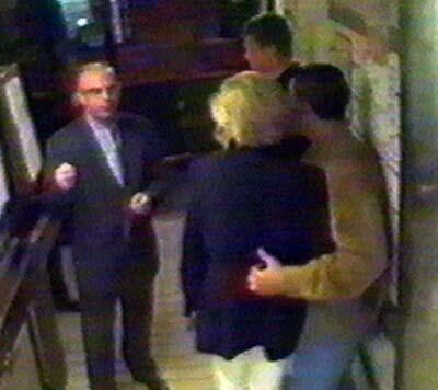 Dodi Fayed, right, puts his arm around Diana, Princess of Wales, in this picture made from a security video taken at the Ritz Hotel in Paris in the early hours of Aug. 31, 1997, as they talk to driver Henri Paul. Bodyguard Trevor Rees-Jones, the sole survivor of the crash, is seen in the background. Not long after, the car driven by Paul crashed, killing him, Dodi Fayed and Diana.