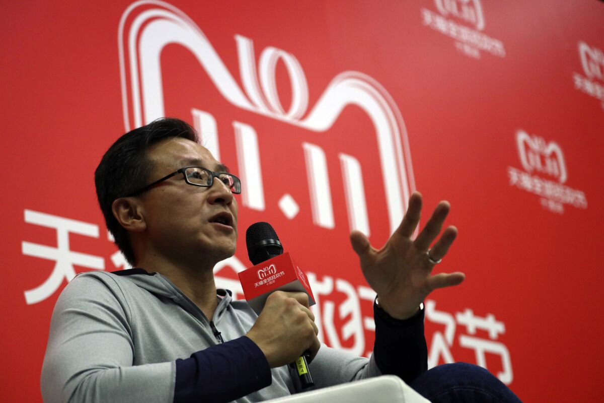Joe Tsai, executive vice chairman of Alibaba Group, speaks to journalists during Alibaba's 11.11 Global Shopping Festival, also known as Singles Day in Shanghai, China, in 2018.