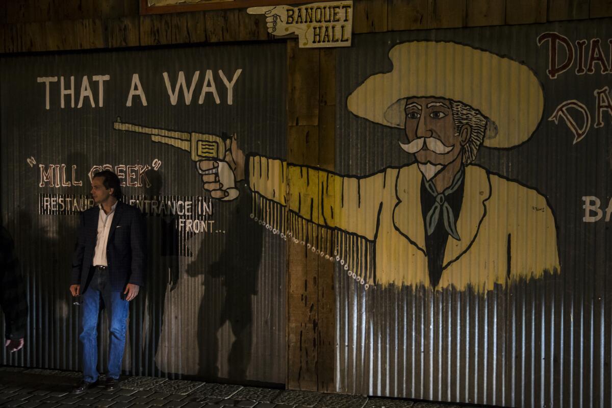 U.S. Senate candidate Tom Del Beccaro waits for his car in the parking lot outside the Mill Creek Cattle Company after speaking at a meeting of the Redlands Tea Party Patriots.