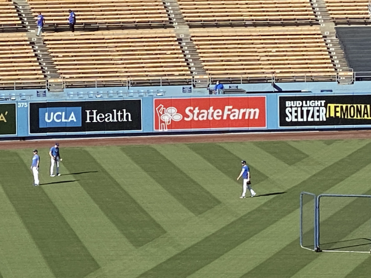 Dodgers players immortalized Gavin Lux's wall-crashing exploits during Wednesday's game.