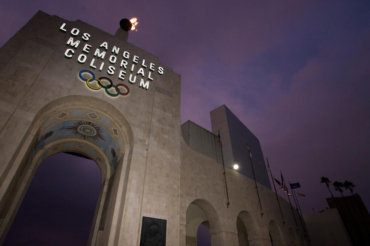 FILE - This Feb. 13, 2008, file photo shows the Los Angeles Memorial Coliseum in Los Angeles. University of Southern California President C.L. Max Nikias announced Monday, Jan. 29, 2018, that the stadium will be renamed United Airlines Memorial Coliseum. The announcement was made during a ceremonial groundbreaking for a $270 million renovation of the 95-year-old stadium.