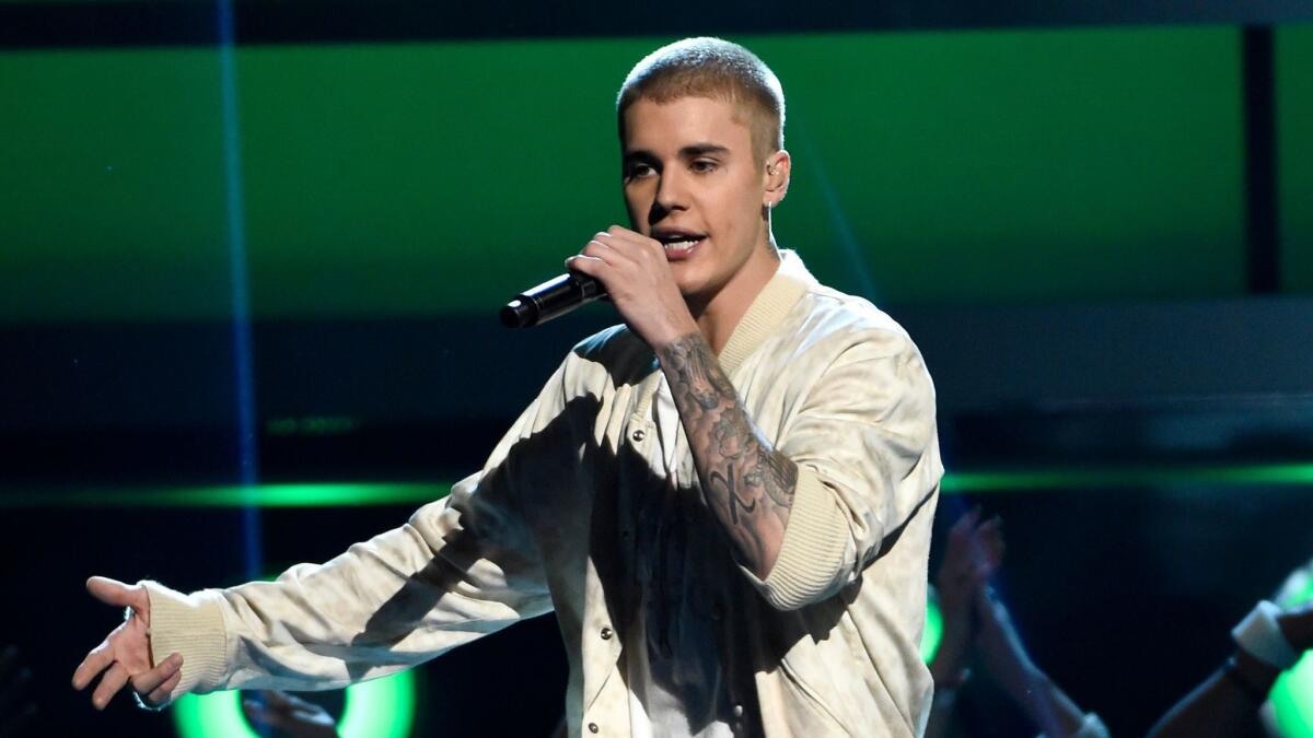 Police say Justin Bieber will not be charged for striking a celebrity photographer with his pickup last month.