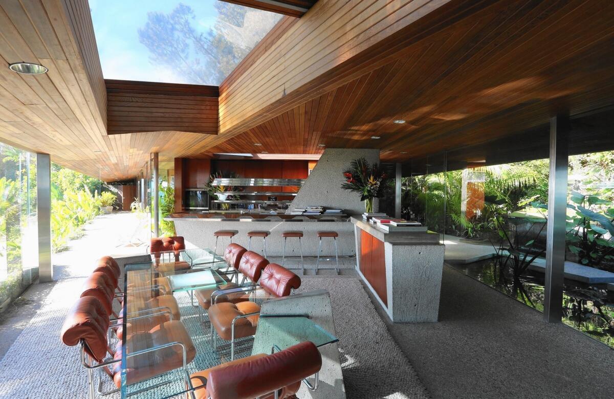 The kitchen and dining area of homeowner Jim Goldstein's John Lautner house in Beverly Hills.