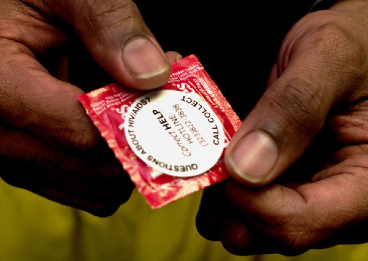 A Lifestyles condom with the number of an HIV/AIDS hotline.