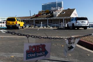 Joe’s Crab Shack, which The Port is looking to replace with a new restaurant, as seen on Monday, Dec. 19, 2022. The Rady Shell at Jacob’s Park is located just across the parking lot.