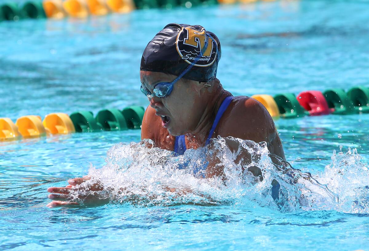 Fountain Valley's Kaitlyn Nguyen swims the breaststroke leg of the 200 medley relay during Thursday's meet.