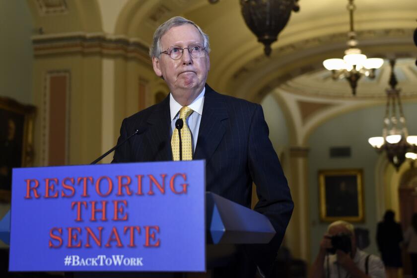 Senate Majority Leader Mitch McConnell (R-Ky.) speaks to reporters on Capitol Hill in Washington on Thursday.