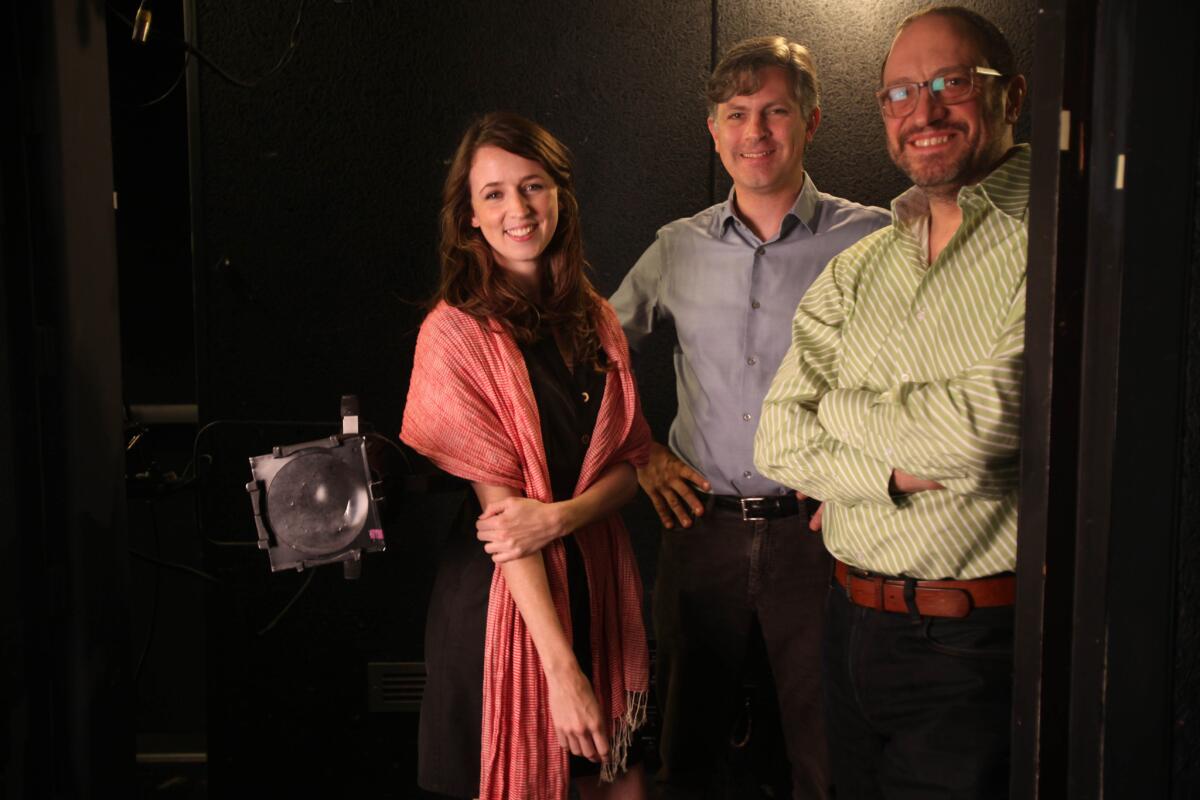 Director John Collins, center, is leading the helm of the Elevator Repair Service's production of "Gatz," a page-by-page reading performance adaptation of "The Great Gatsby." Robert Cucuzza, right, plays Tom and Kristen Sieh, left, plays Catherine.