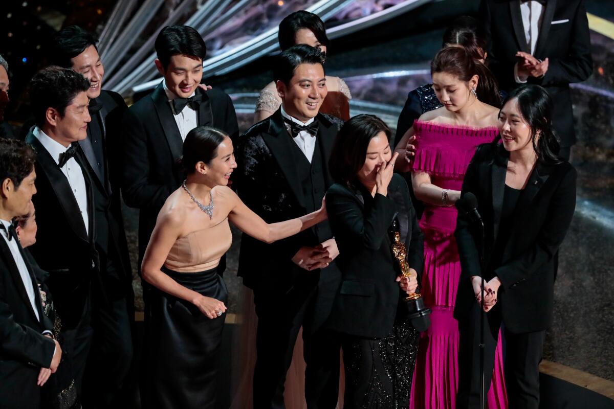 The cast of “Parasite,” winners of the best picture Oscar on stage during the telecast of the 92nd Academy Awards.