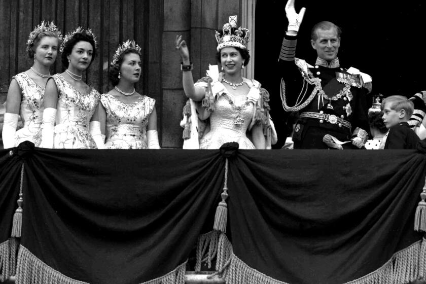 Britain's Queen Elizabeth II and Prince Philip, Duke of Edinburgh, gather with other members of the British royal family 