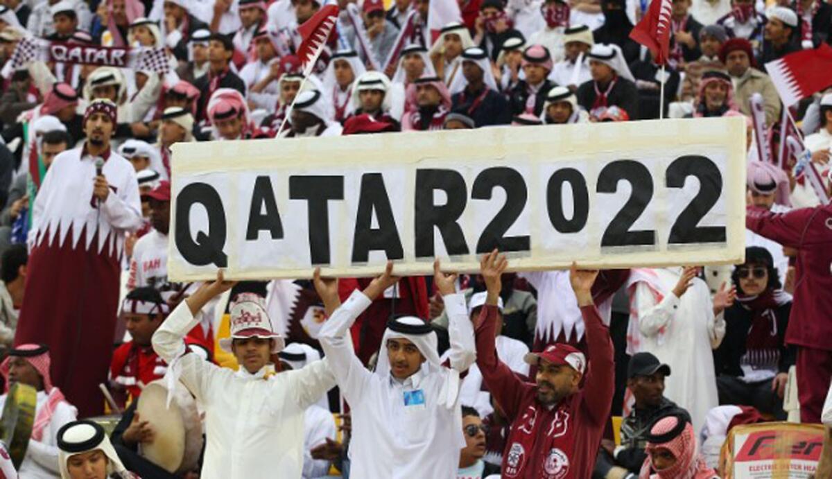 Fan de Qatar celebran la asignación de la Copa del Mundo 2022.