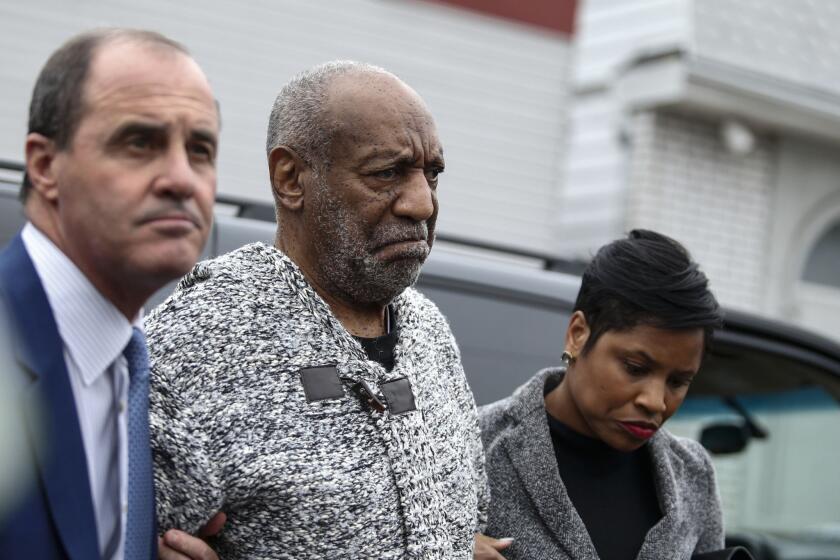 Bill Cosby arrives at court on Wednesday in Elkins Park, Pa., to face charges of aggravated indecent assault.