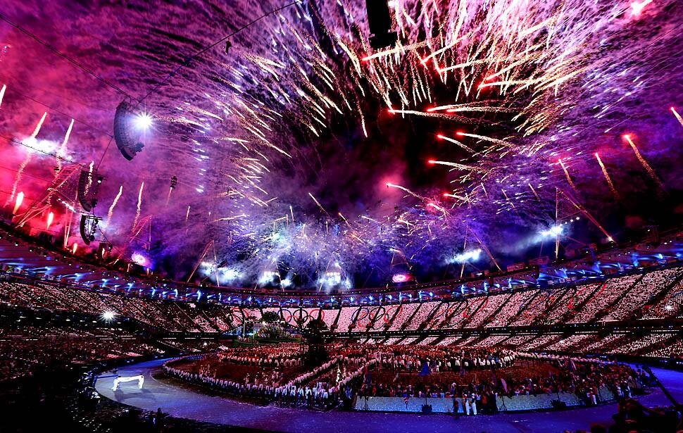 Fireworks ring the perimeter of Olympic Stadium.