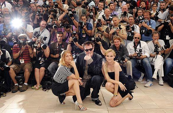 German actress Diane Kruger, left, American director Quentin Tarantino and French actress Melanie Laurent at a publicity event for the movie "Inglorious Basterds," in competition at the 62nd Cannes Film Festival.