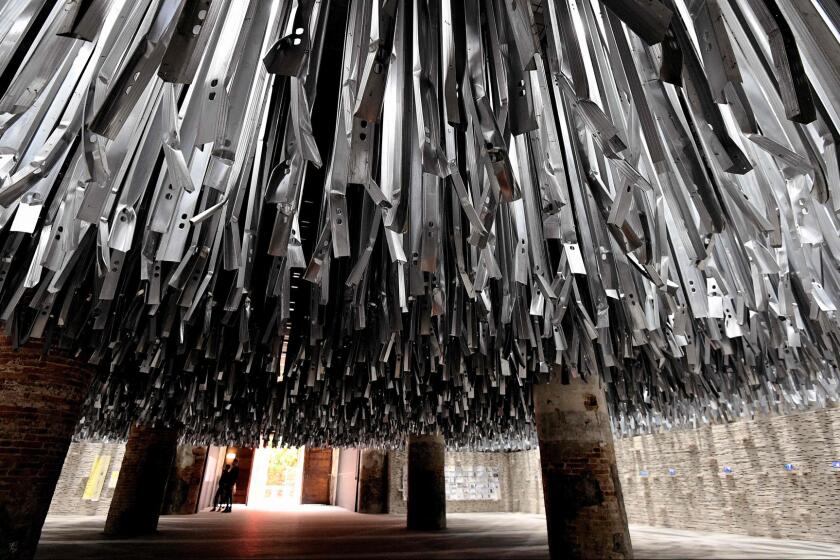 A dramatic installation by Venice Architecture Biennale Director Alejandro Aravena employs the tons of detritus left behind by last year's Venice art biennial.