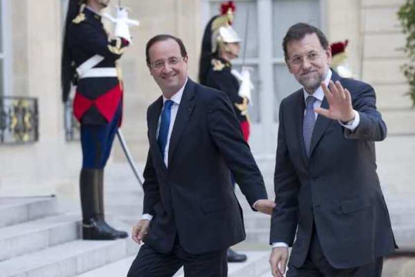 French President Francois Hollande, left, with Spanish Prime Minister Mariano Rajoy before a meeting at the Elysee Palace in Paris.