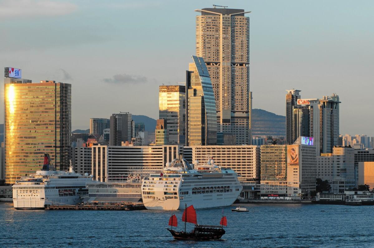 The Hong Kong Tourism Board estimates that China — with a population of 1.4 billion — has the potential to generate as many as 83 million cruise passengers a year. Above, ships dock in Hong Kong's Victoria Harbor.
