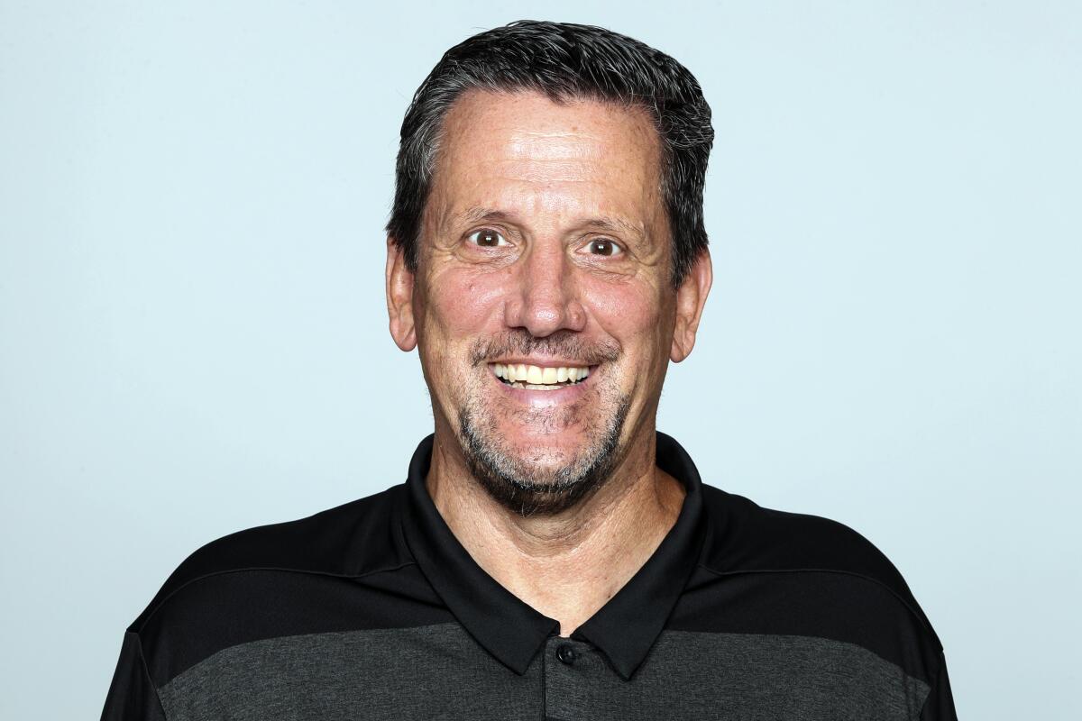 FILE - This is a 2019 file photo shows Greg Knapp of the Atlanta Falcons NFL football team. Knapp, currently a New York Jets assistant coach was in a “horrific” bicycle accident last weekend and is in critical condition. Denver TV station 9News reported Monday night, July 29, 2021, that Knapp was hit by a vehicle while riding in California. Agent Jeff Sperbeck confirmed to the station the 58-year-old longtime NFL assistant was hospitalized. (AP Photo/File)