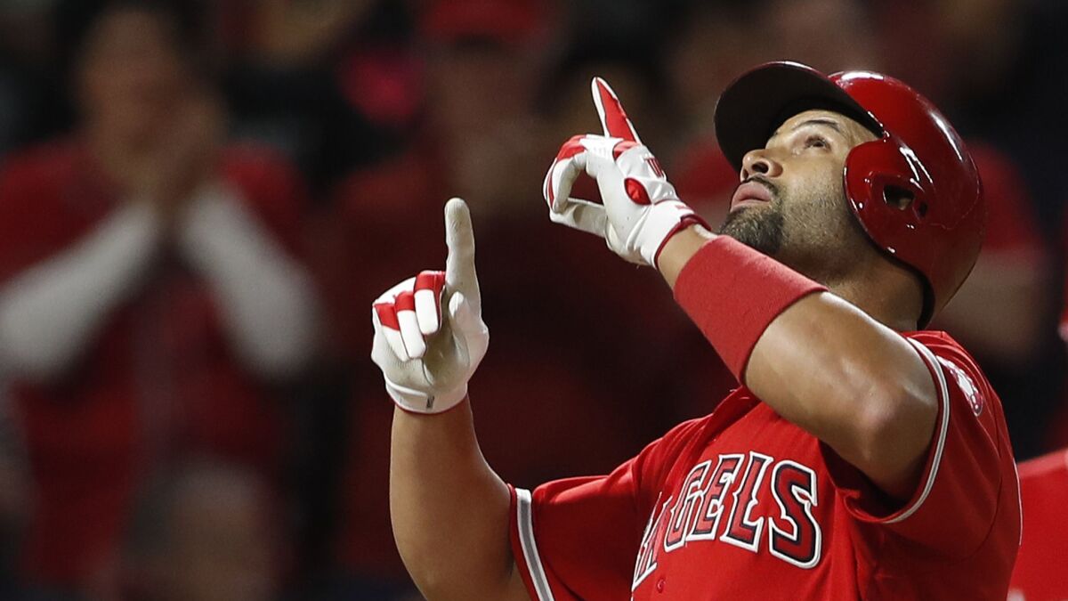 Albert Pujols had his season cut short after surgery to his left knee. He will now undergo surgery for a bone spur.