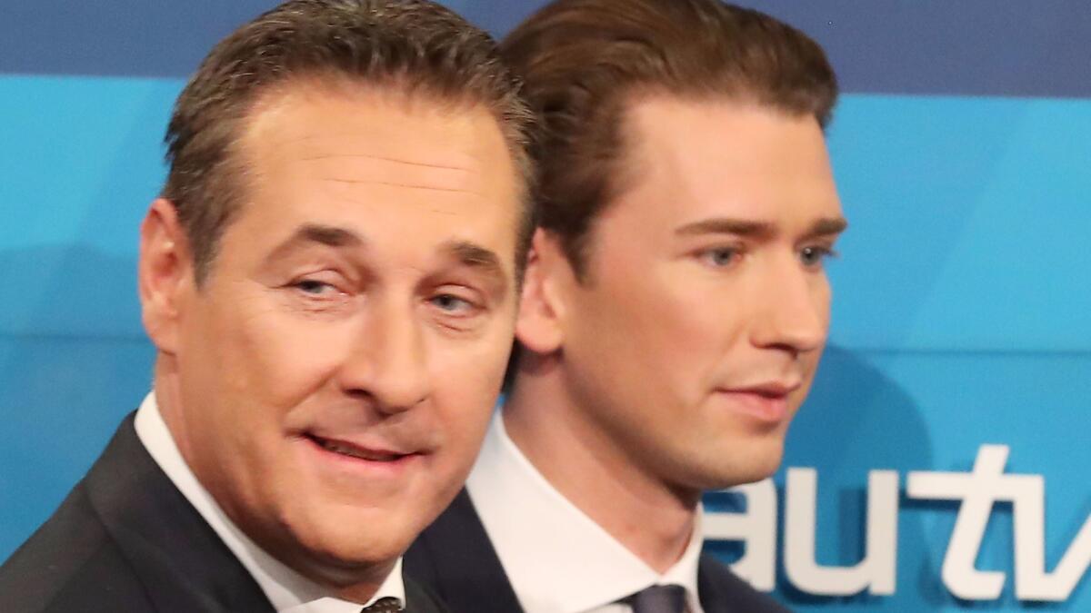 Heinz-Christian Strache, left, of the right-wing Freedom Party and Sebastian Kurz, leader of the conservative People's Party, after a television interview Sunday in Vienna.