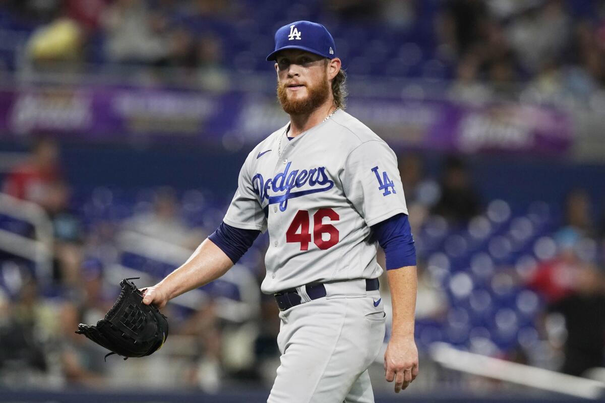 Dodgers relief pitcher Craig Kimbrel walks off the pitcher's mound.