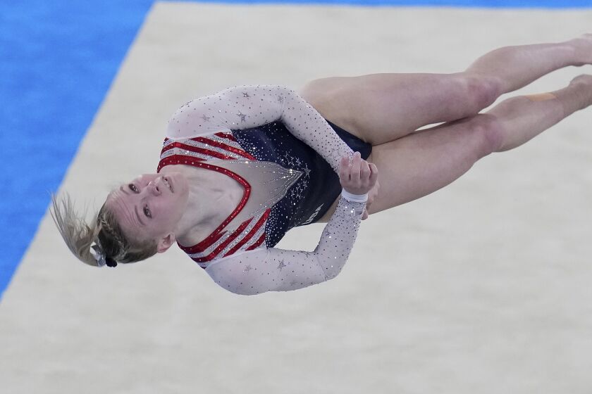 Jade Carey, of the United States, performs on the floor.