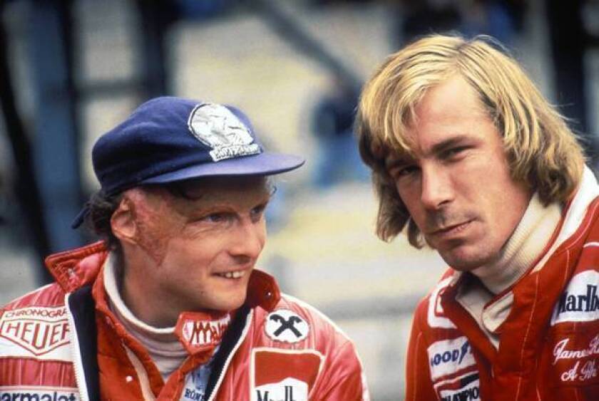 Driver Niki Lauda of Austria, left, talks to rival James Hunt before the Belgian Grand Prix in 1977. His life is the basis of the film "Rush."