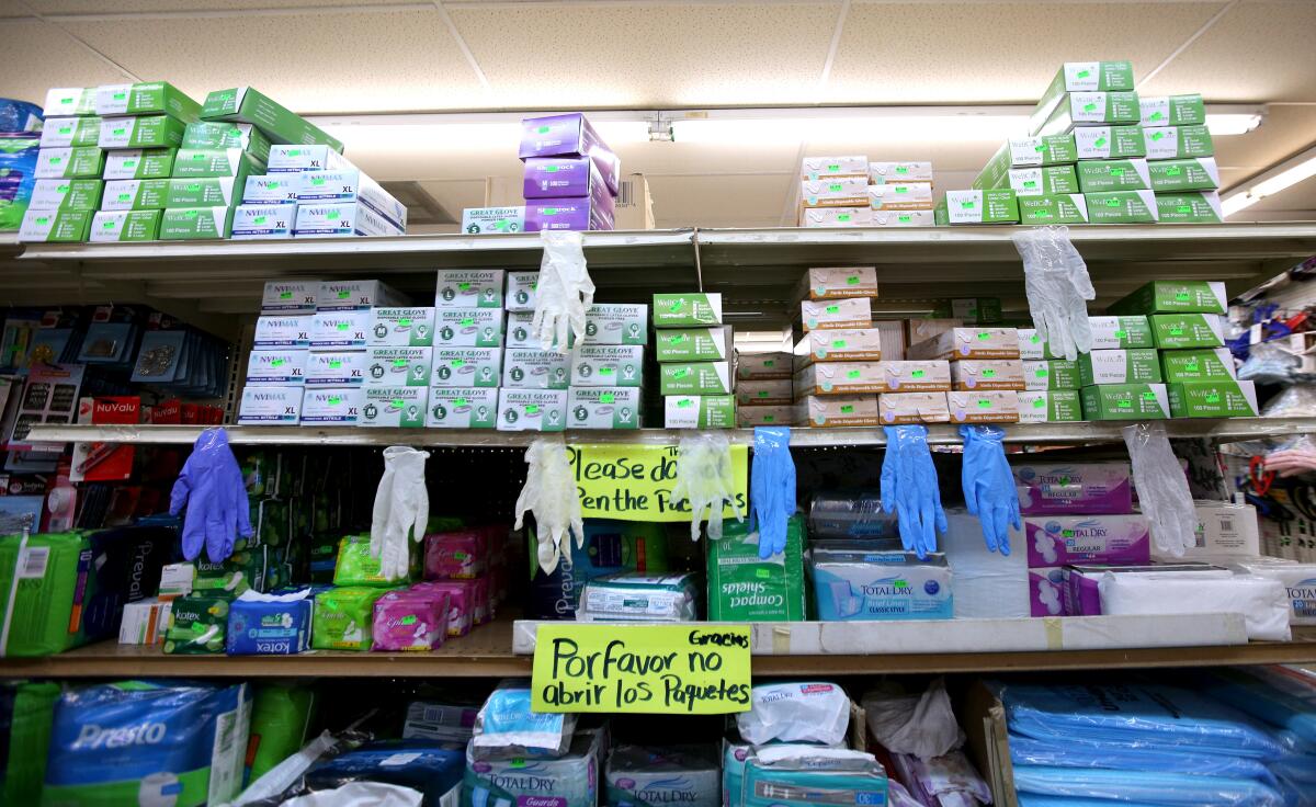 A Glendale store stocked with gloves and masks on South Verdugo Road. The city's cases of the novel coronavirus, now at 76, have been rapidly rising since the city reported its first infected patient on March 16.