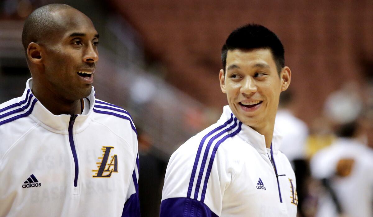 The Lakers' starting backcourt of Kobe Bryant, left, and Jeremy Lin will have plenty of motivation to play well in the season opener against Dwight Howard and the Houston Rockets.