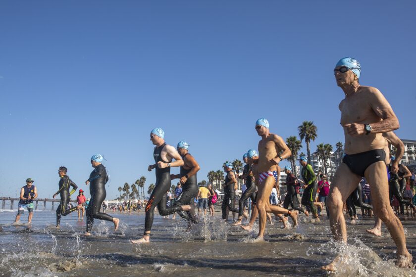 Oceanside, CA - September 05: More than 400 people raced one-mile during the 93rd Labor Day Pier Swim in on Monday, Sept. 5, 2022 in Oceanside, CA. (Ana Ramirez / The San Diego Union-Tribune)