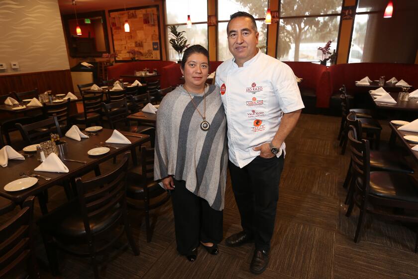 Leo and Teresa Razo in their restaurant and market Villa Roma in Laguna Hills. 