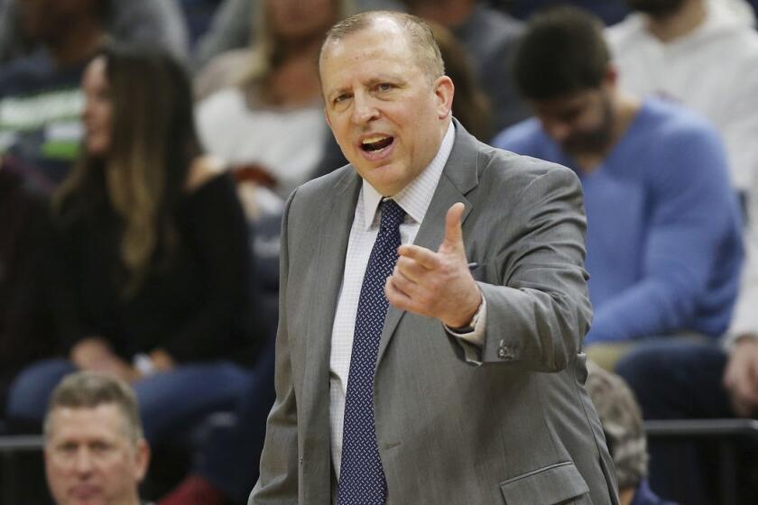 Minnesota Timberwolves' head coach Tom Thibodeau calls out to his team during the second half of an NBA basketball game against the Los Angeles Lakers, Sunday, Jan. 6, 2019, in Minneapolis. A person with knowledge of the decision tells The Associated Press that the Timberwolves have fired Thibodeau halfway into his third season with the team that began with turmoil surrounding All-Star Jimmy Butler. The person spoke to the AP on condition of anonymity, because the Timberwolves had not yet announced the news. The Athletic first reported that Thibodeau, who was also the president of basketball operations with full authority over the roster, had been let go. (AP Photo/Stacy Bengs)