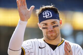 San Diego, CA - May 3: San Diego Padres' Brett Sullivan smiles after a win against the Cincinnati Reds at Petco Park on Wednesday, May 3, 2023 in San Diego, CA. (K.C. Alfred / The San Diego Union-Tribune)