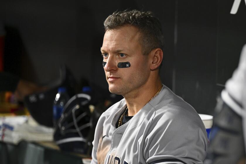 New York Yankees' Josh Donaldson looks on from the dugout during the ninth inning.