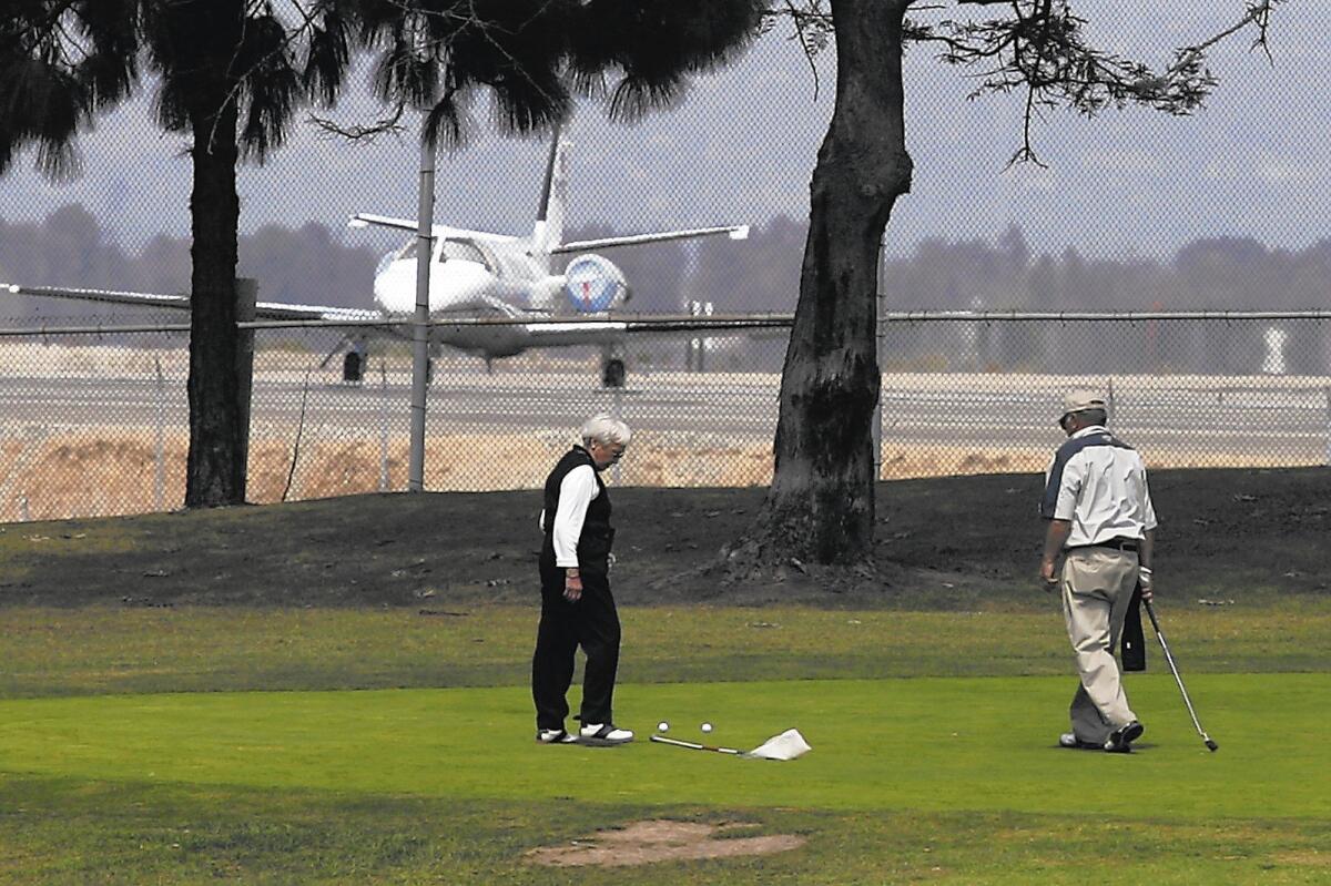 The city of Newport Beach hopes a lease extension for Newport Beach Golf Course would head off any runway expansion at nearby John Wayne Airport.