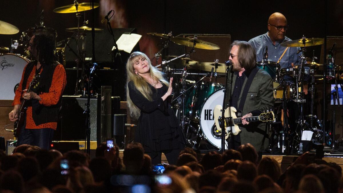 Tom Petty was joined by Stevie Nicks on Friday during an event honoring him as the Recording Academy's Person of the Year, a benefit for the MusiCares Foundation.